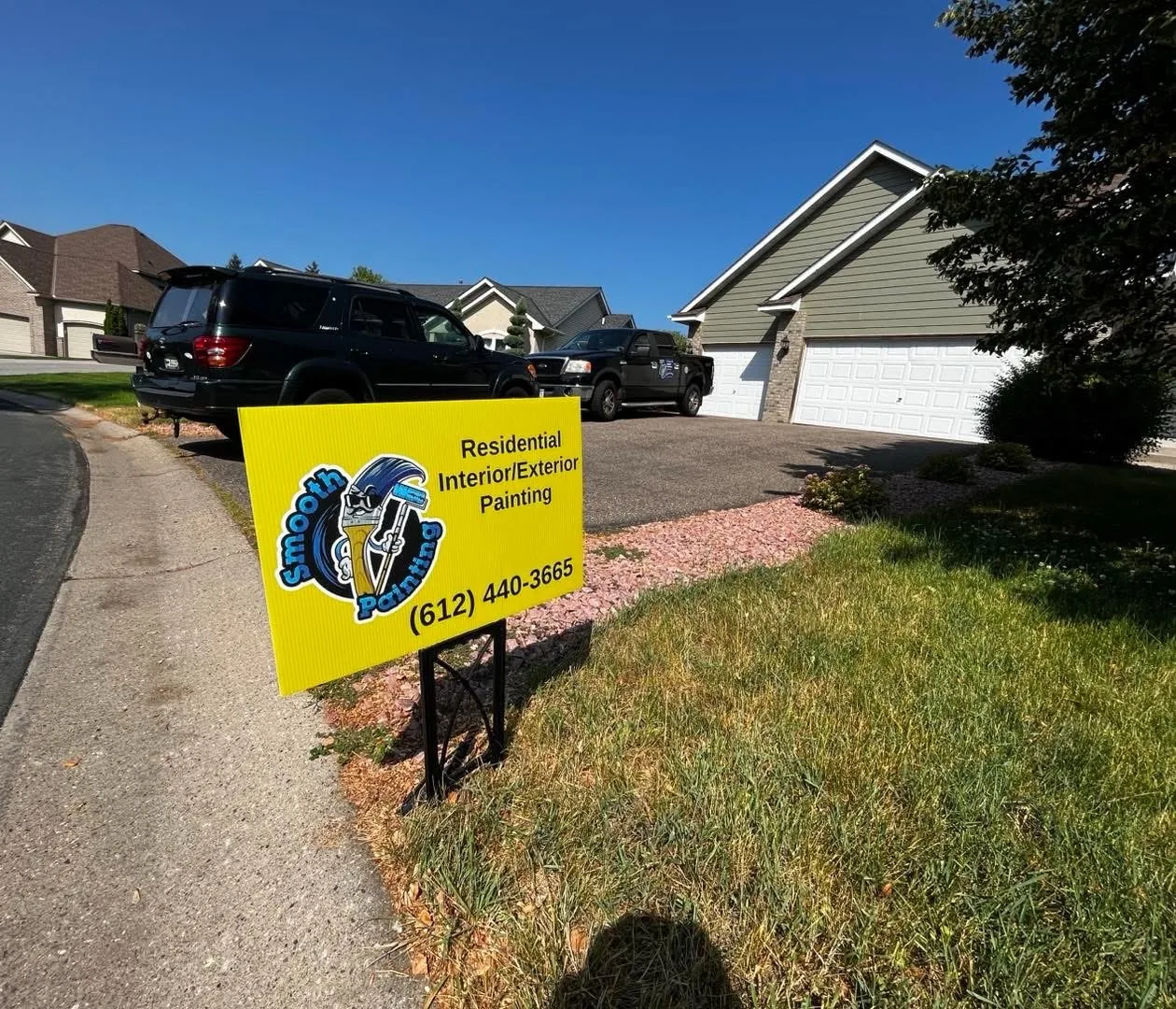 Smooth Painting crew on an exterior repaint in the East Metro