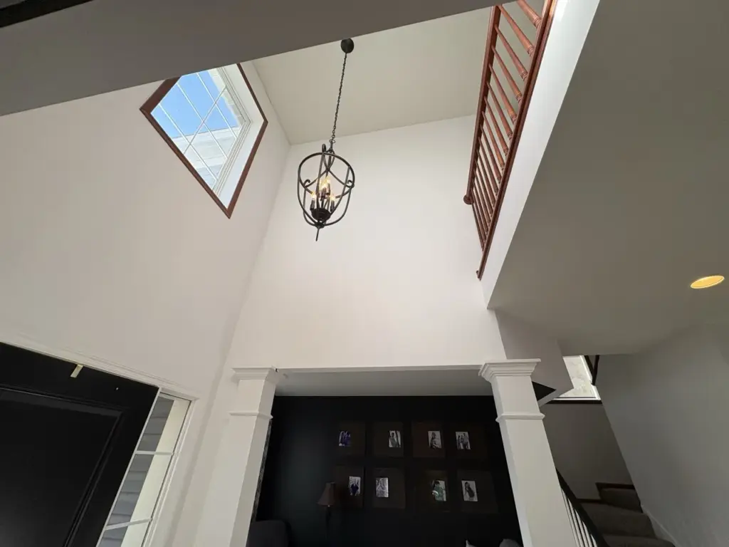 Interior house painting by Smooth Painting — vaulted living gray